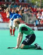 22 August 2007; Eugene Magee, Ireland, looks on as the French players celebrate victory. 2007 EuroHockey Nations Championships, Mens, Pool B, Ireland v France, Belle Vue Hockey Centre, Kirkmanshulme Lane, Belle Vue, Manchester, England. Picture credit: Pat Murphy / SPORTSFILE