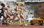 25 August 2007; Ireland's Roisin McGettigan, 558, leads Hattie Dean, 13, of Great Britain, Veerle Dejaeghere, 246, of Belgium, and eventual winner Eunice Jepkorir, 641, of Kenya, during the heats of the Women's 3000m Steeplechase where she finished in a time of 9.39.41 to qualify for Monday's final. The 11th IAAF World Championships in Athletics, Nagai Stadium, Osaka, Japan. Picture credit: Brendan Moran / SPORTSFILE  *** Local Caption ***
