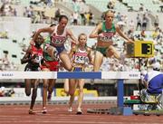 25 August 2007; Ireland's Roisin McGettigan, 558, leads Tatyana Petrova, 829, of Russia, during the heats of the Women's 3000m Steeplechase where she finished in a time of 9.39.41 to qualify for Monday's final. The 11th IAAF World Championships in Athletics, Nagai Stadium, Osaka, Japan. Picture credit: Brendan Moran / SPORTSFILE  *** Local Caption ***