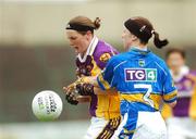 25 August 2007; Caroline Murphy, Wexford, in action against Maeve Corcoran, Tipperary. TG4 All-Ireland Intermediate Ladies Football Championship Semi-Final, Tipperary v Wexford, O'Moore Park, Portlaoise. Photo by Sportsfile *** Local Caption ***