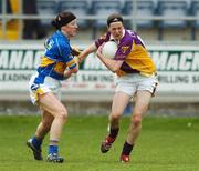 25 August 2007; Caroline Murphy, Wexford, in action against Maeve Corcoran, Tipperary. TG4 All-Ireland Intermediate Ladies Football Championship Semi-Final, Tipperary v Wexford, O'Moore Park, Portlaoise. Photo by Sportsfile  *** Local Caption ***