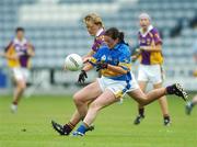 25 August 2007; Michelle Hearne, Wexford, in action against Claire Lambert, Tipperary. TG4 All-Ireland Intermediate Ladies Football Championship Semi-Final, Tipperary v Wexford, O'Moore Park, Portlaoise. Photo by Sportsfile  *** Local Caption ***