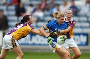 25 August 2007; Deirdre Fox, Tipperary, in action against Mairead Crowe, left, and Angela McDermott, Wexford. TG4 All-Ireland Intermediate Ladies Football Championship Semi-Final, Tipperary v Wexford, O'Moore Park, Portlaoise. Photo by Sportsfile  *** Local Caption ***