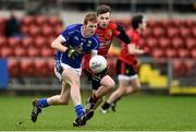4 January 2015; Jason McLoughlin, Cavan, in action against Donal O'Hare, Down. Dr McKenna Cup, Round 1, Down v Cavan. Pairc Esler, Newry, Co. Down. Picture credit: Ramsey Cardy / SPORTSFILE