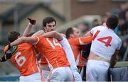 4 January 2015; Finnain Moriarty, Aaron Findon and Ciaran McKeever, Armagh, in dispute with Kyle Coney and Sean Cavanagh, Tyrone during a first half incident which saw 2 red Cards issued. Bank of Ireland Dr McKenna Cup, Group C, Round 1, Armagh v Tyrone. Athletic Grounds, Armagh. Picture credit: Oliver McVeigh / SPORTSFILE