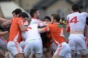 4 January 2015; Stefan Campbell Michael Murray and Ciaran McKeever, Armagh, in dispute with Kyle Coney and Sean Cavanagh, Tyrone during a first half incident which saw 2 red Cards issued. Bank of Ireland Dr McKenna Cup, Group C, Round 1, Armagh v Tyrone. Athletic Grounds, Armagh. Picture credit: Oliver McVeigh / SPORTSFILE