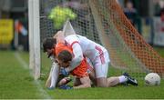 4 January 2015; Mark McConville, Armagh, tussles with Shea McGuigan, Tyrone, during a first half incident which saw 2 red Cards issued. Bank of Ireland Dr McKenna Cup, Group C, Round 1, Armagh v Tyrone. Athletic Grounds, Armagh. Picture credit: Oliver McVeigh / SPORTSFILE
