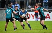 4 January 2015; Eoghan O'Gara, Dublin, in action against Conor Carton, left, David Hyland, centre, and Padraig Faulker, Maynooth University. O'Byrne Cup, Group A, Round 1, Dublin v Maynooth University. Parnell Park, Dublin. Picture credit: Pat Murphy / SPORTSFILE