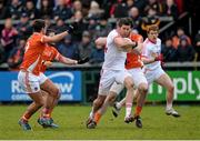 4 January 2015; Sean Cavanagh, Tyrone, in action against Eugene McVerry, Stefan Campbell and Aaron Findon, Armagh. Bank of Ireland Dr McKenna Cup, Group C, Round 1, Armagh v Tyrone. Athletic Grounds, Armagh. Picture credit: Oliver McVeigh / SPORTSFILE