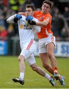 4 January 2015; Shea McGuigan, Tyrone, in action against Stefan Campbell, Armagh. Bank of Ireland Dr McKenna Cup, Group C, Round 1, Armagh v Tyrone. Athletic Grounds, Armagh. Picture credit: Oliver McVeigh / SPORTSFILE