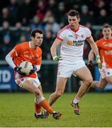 4 January 2015; Jamie Clarke, Armagh, in action against Padraig McNulty, Tyrone. Bank of Ireland Dr McKenna Cup, Group C, Round 1, Armagh v Tyrone. Athletic Grounds, Armagh. Picture credit: Oliver McVeigh / SPORTSFILE