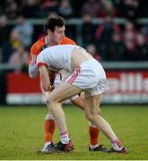 4 January 2015; Cathal McShane, Tyrone, in action against Jamie Clarke, Armagh. Bank of Ireland Dr McKenna Cup, Group C, Round 1, Armagh v Tyrone. Athletic Grounds, Armagh. Picture credit: Oliver McVeigh / SPORTSFILE