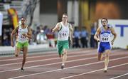28 August 2007; Ireland's Paul Hession, competes with Patrick Johnson, left, of Australia, and Anastasios Gousis, right, of Greece, on his way to winning his quarter-final of the Men's 200m in a time of 20.50 seconds and qualifying for Wednesday's semi-finals. The 11th IAAF World Championships in Athletics, Nagai Stadium, Osaka, Japan. Picture credit: Brendan Moran / SPORTSFILE  *** Local Caption ***