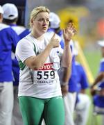 30 August 2007; Ireland's Eileen O'Keeffe signals to Jim Kilty during the Women's Hammer Final where she threw a distance of 70.93 metres and finished in 6th place overall. The 11th IAAF World Championships in Athletics, Nagai Stadium, Osaka, Japan. Picture credit: Brendan Moran / SPORTSFILE  *** Local Caption ***