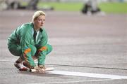30 August 2007; Ireland's Eileen O'Keeffe rolls up her warm-up mat after competing in the Women's Hammer Final where she threw a distance of 70.93 metres and finished in 6th place overall. The 11th IAAF World Championships in Athletics, Nagai Stadium, Osaka, Japan. Picture credit: Brendan Moran / SPORTSFILE  *** Local Caption ***