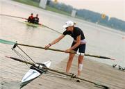 30 August 2007; Orlagh Duddy, Lightweight Womens Single Sculls, places her oar on her boat for practice during the 2007 World Rowing Championships, Oberschleissheim, Munich, Germany. Picture credit: David Maher / SPORTSFILE