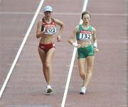 31 August 2007; Ireland's Olive Loughnane, 132, competes with Elena Ginko, of Belarus, while coming down the finishing straight in the Women's 20km Walk Final where she finished in 17th place in a time of 1:36.00. The 11th IAAF World Championships in Athletics, Nagai Stadium, Osaka, Japan. Picture credit: Brendan Moran / SPORTSFILE  *** Local Caption ***