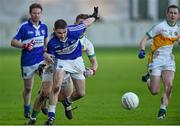 4 January 2015; Nigel Murphy, Laois, in action against Ruarai Allen, Offaly. Bord na Mona O'Byrne Cup, Group A, Round 1, Offaly v Laois. O'Connor Park, Tullamore, Co. Offaly. Picture credit: Barry Cregg / SPORTSFILE