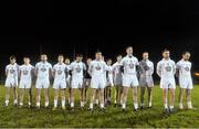 7 January 2015; Players from Kildare stand during a minute silence as a mark of respect for the four victims of a road traffic accident  in the vicinity yesterday. Bord na Mona O'Byrne Cup, Group B, Round 2, Kildare v Carlow, Geraldine Park, Athy, Co. Kildare. Picture credit: David Maher / SPORTSFILE