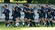 6 September 2007; Northern Ireland players, warm up at the start of squad training. Northern Ireland Squad Training, Arcadia training ground, Riga, Latvia. Picture credit; Oliver McVeigh / SPORTSFILE