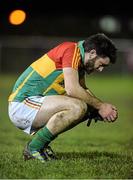 7 January 2015; A disappointed Shane Redmond, Carlow, at the end of the game. Bord na Mona O'Byrne Cup, Group B, Round 2, Kildare v Carlow, Geraldine Park, Athy, Co. Kildare. Picture credit: David Maher / SPORTSFILE