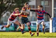 10 January 2015; Tom Farrell, Lansdowne, is tackled by Evan Ryan, left, and Ariel Robles, Clontarf. Ulster Bank League Division 1A, Clontarf v Lansdowne, Castle Avenue, Clontarf, Co. Dublin. Picture credit: Matt Browne / SPORTSFILE