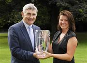 6 September 2007; Kerry Gaelic Football legend Mick O'Dwyer was today inducted into the MBNA Kick Fada Hall of Fame at a presentation in the MBNA offices in St Stephens Green. Here Micko is presented with the Waterford Glass trophy by Ciara Kennedy, Business Development Manager, MBNA Ireland. Over 20 stars of Gaelic Football will compete for the prestigious All-Ireland title at the 8th annual MBNA Kick Fada All-Ireland final which takes place at Bray Emmets GAA Club on 8th September 2007. MBNA Headquarters, St. Stephen's Green, Dublin. Picture credit: Ray McManus / SPORTSFILE