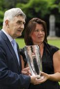 6 September 2007; Kerry Gaelic Football legend Mick O'Dwyer was today inducted into the MBNA Kick Fada Hall of Fame at a presentation in the MBNA offices in St Stephens Green. Here Micko is presented with the Waterford Glass trophy by Ciara Kennedy, Business Development Manager, MBNA Ireland. Over 20 stars of Gaelic Football will compete for the prestigious All-Ireland title at the 8th annual MBNA Kick Fada All-Ireland final which takes place at Bray Emmets GAA Club on 8th September 2007. MBNA Headquarters, St. Stephen's Green, Dublin. Picture credit: Ray McManus / SPORTSFILE