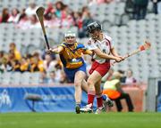 9 September 2007; Brid Convery, Derry, in action against Aoife Ryan, Clare. Gala All-Ireland Junior Camogie Final, Clare v Derry, Croke Park, Dublin. Picture credit; Paul Mohan / SPORTSFILE *** Local Caption ***