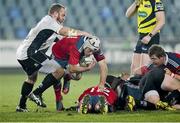 10 January 2015; Duncan Williams, Munster, is tackled by  Dario Chistolini, Zebre. Guinness PRO12 Round 13, Zebre v Munster, Stadio XXV Aprile, Parma, Italy. Picture credit: Roberto Bregani / SPORTSFILE