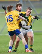 3 January 2015; Barry O'Sullivan, Kerry, in action against Noel Gatley, left, and Kevin Finn, Roscommon. Roscommon v Kerry, Hastings Cup 2015 Group 2 Round 1. Gort GAA Grounds, Gort, Co. Galway. Picture credit: Pat Murphy / SPORTSFILE
