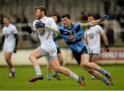 11 January 2015; Ciarán Fitzpatrick, Kildare, in action against Ryan Basquel, UCD. Bord na Mona O'Byrne Cup, Group B, Round 3, Kildare v UCD. St Conleth's Park, Newbridge, Co. Kildare. Picture credit: Piaras Ó Mídheach / SPORTSFILE