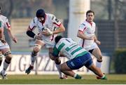 11 January 2015; Dan Tuohy, Ulster, is tackled by Matteo Zanusso, Benetton Treviso. Guinness PRO12 Round 13, Benetton Treviso v Ulster, Stadio Monigo, Treviso, Italy. Picture credit: Roberto Bregani / SPORTSFILE