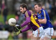 11 January 2015; Brian Malone, Wexford, in action against Chris Murphy, Wicklow. Bord na Mona O'Byrne Cup, Group D, Round 3, Wexford v Wicklow, Pairc Ui Suiochan, Gorey, Co. Wexford. Picture credit: Matt Browne / SPORTSFILE