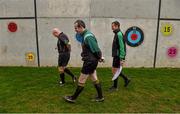 11 January 2015; Referee Richard Moloney, left, and his linesmen Johnny Murphy, centre, and Shane Florish, right, make their way out for the start of the game. McGrath Cup Quarter-Final, Tipperary v Cork, Clonmel Sportsfield, Clonmel, Co. Tipperary. Picture credit: Diarmuid Greene / SPORTSFILE