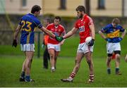 11 January 2015; Colin O'Riordan, Tipperary, and Eoin Cadogan, Cork, exchange a handshake after the game. McGrath Cup Quarter-Final, Tipperary v Cork, Clonmel Sportsfield, Clonmel, Co. Tipperary. Picture credit: Diarmuid Greene / SPORTSFILE