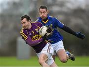 11 January 2015; Kevin Day, Wexford, in action against John McGrath, Wicklow. Bord na Mona O'Byrne Cup, Group D, Round 3, Wexford v Wicklow, Pairc Ui Suiochan, Gorey, Co. Wexford. Picture credit: Matt Browne / SPORTSFILE