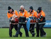 11 January 2015; Kevin McKernan, Down is stretchered off the field with his leg heavily strapped in the second half. Bank of Ireland Dr McKenna Cup, Group A, Round 2, Monaghan v Down, St Tiernach's Park, Clones, Co. Monaghan. Picture credit: Oliver McVeigh / SPORTSFILE