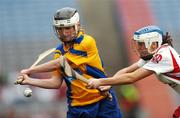 9 September 2007; Aoife Ryan, Clare, in action against Edelle Henry, Derry. Gala All-Ireland Junior Camogie Final, Clare v Derry, Croke Park, Dublin. Picture credit; Brian Lawless / SPORTSFILE