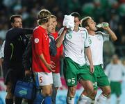 12 September 2007; Richard Dunne, Republic of Ireland, has to leave the pitch during the second half to receive medical attention. 2008 European Championship Qualifier, Czech Republic v Republic of Ireland, Sparta Prague Stadium, Prague, Czech Republic. Picture Credit: David Maher / SPORTSFILE