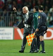 12 September 2007; Karel Bruckner, Czech Republic manager, is restrained by the fourth official, Michalis Germanakos, during the second half. 2008 European Championship Qualifier, Czech Republic v Republic of Ireland, Sparta Prague Stadium, Prague, Czech Republic. Picture Credit: David Maher / SPORTSFILE