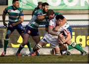 11 January 2015; Louis Ludik, Ulster, is tackled by Rupert Harden, Benetton Treviso. Guinness PRO12 Round 13, Benetton Treviso v Ulster, Stadio Monigo, Treviso, Italy. Picture credit: Roberto Bregani / SPORTSFILE