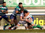 11 January 2015; Clive Ross, Ulster, is tackled by Rupert Harden, Benetton Treviso. Guinness PRO12 Round 13, Benetton Treviso v Ulster, Stadio Monigo, Treviso, Italy. Picture credit: Roberto Bregani / SPORTSFILE