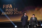 12 January 2015; James Rodríguez, of Colombia, right, who was presented with he FIFA Puskas Award by former French international footballer Christian Karembeu. FIFA Ballon D'Or 2014. Kongresshaus, Zurich, Switzerland. Picture credit: David Maher / SPORTSFILE