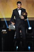 12 January 2015; Cristiano Ronaldo, Real Madrid and Portugal, with his son Cristiano Ronaldo Junior, after winning the FIFA Ballon d'Or. FIFA Ballon D'Or 2014. Kongresshaus, Zurich, Switzerland. Picture credit: David Maher / SPORTSFILE