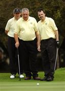 13 September 2007; Caddy Brian Ahern, left, Michael O'Brien and Martin Nolan, right, Woodstock G.C., Ennis, Clare, line up a putt on the 13th during the Bulmers Pierce Purcell Shield Semi-Finals. Bulmers Cups and Shields Finals 2007, Shandon Park Golf Club, Belfast, Co. Antrim. Picture credit: Ray McManus / SPORTSFILE
