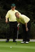 13 September 2007; Liam O'Connor and his playing partner Noel Dinan, left, Woodstock G.C., Ennis, Clare, line up a putt on the 12th during the Bulmers Pierce Purcell Shield Semi-Finals. Bulmers Cups and Shields Finals 2007, Shandon Park Golf Club, Belfast, Co. Antrim. Picture credit: Ray McManus / SPORTSFILE