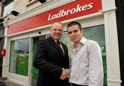 14 September 2007; Pictured at the official opening of the new Ladbrokes shop in Stillorgan are, Joe Lewins, Managing Director, Ladbrokes, and Bernard Dunne. Stillorgan, Dublin. Picture credit: David Maher / SPORTSFILE  *** Local Caption ***