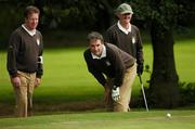14 September 2007; Caddy Michael Mulryan, Odrian Monaghan and Jarlath Crisham, Tuam G.C., Galway, look over a putt on the 16th during the Bulmers Jimmy Bruen Shield Semi-Finals. Bulmers Cups and Shields Finals 2007, Shandon Park Golf Club, Belfast, Co. Antrim. Picture credit: Ray McManus / SPORTSFILE