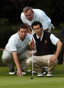 14 September 2007; Caddy Dan Hartnett, left, with Paul Herlihy, right, and his playing partner Denis Lynch, Muskerry G.C., Cork, line up a putt on the 16th during the Bulmers Jimmy Bruen Shield Semi-Finals. Bulmers Cups and Shields Finals 2007, Shandon Park Golf Club, Belfast, Co. Antrim. Picture credit: Ray McManus / SPORTSFILE